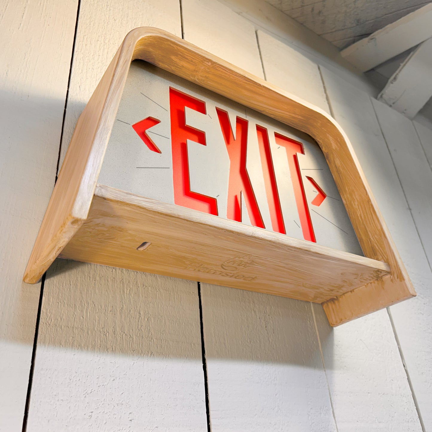 Electra Revival Exit Sign