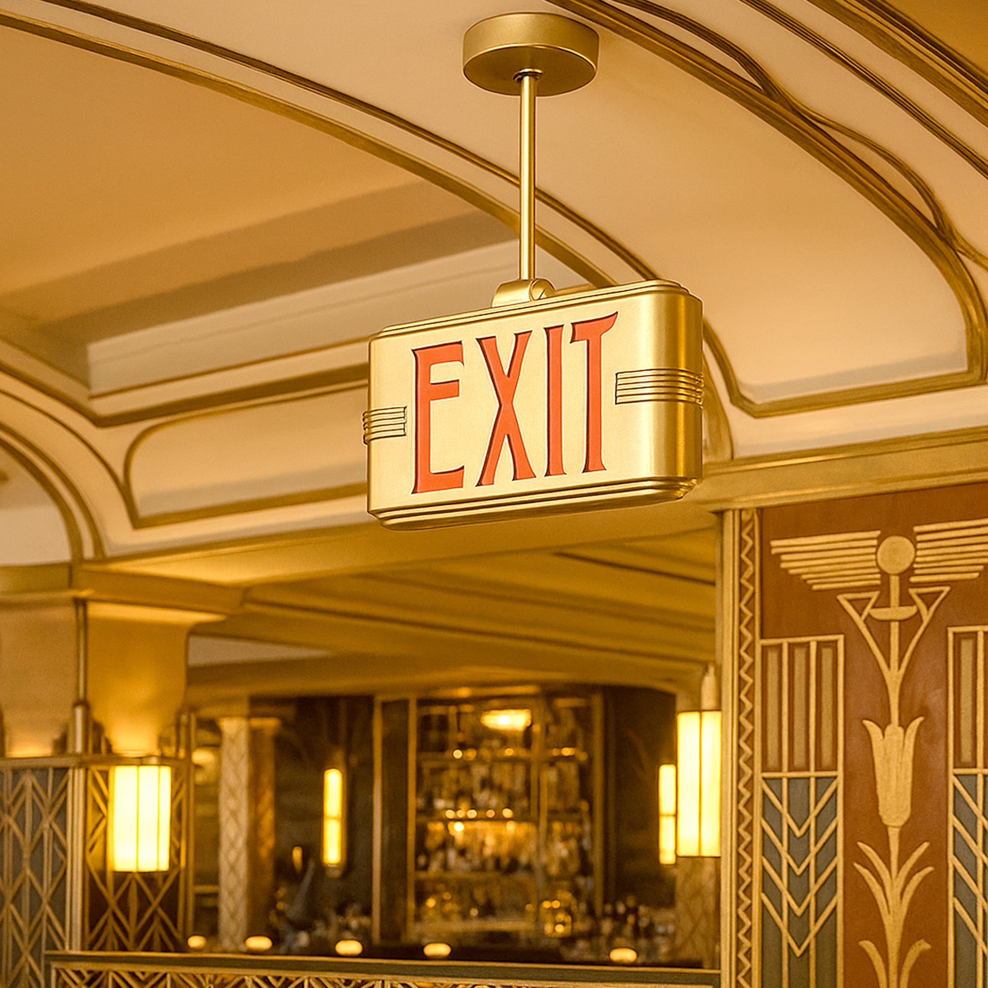 Art Deco exit sign in a stylish interior setting with gold accents and intricate designs.